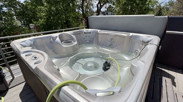 image of draining a hot tub