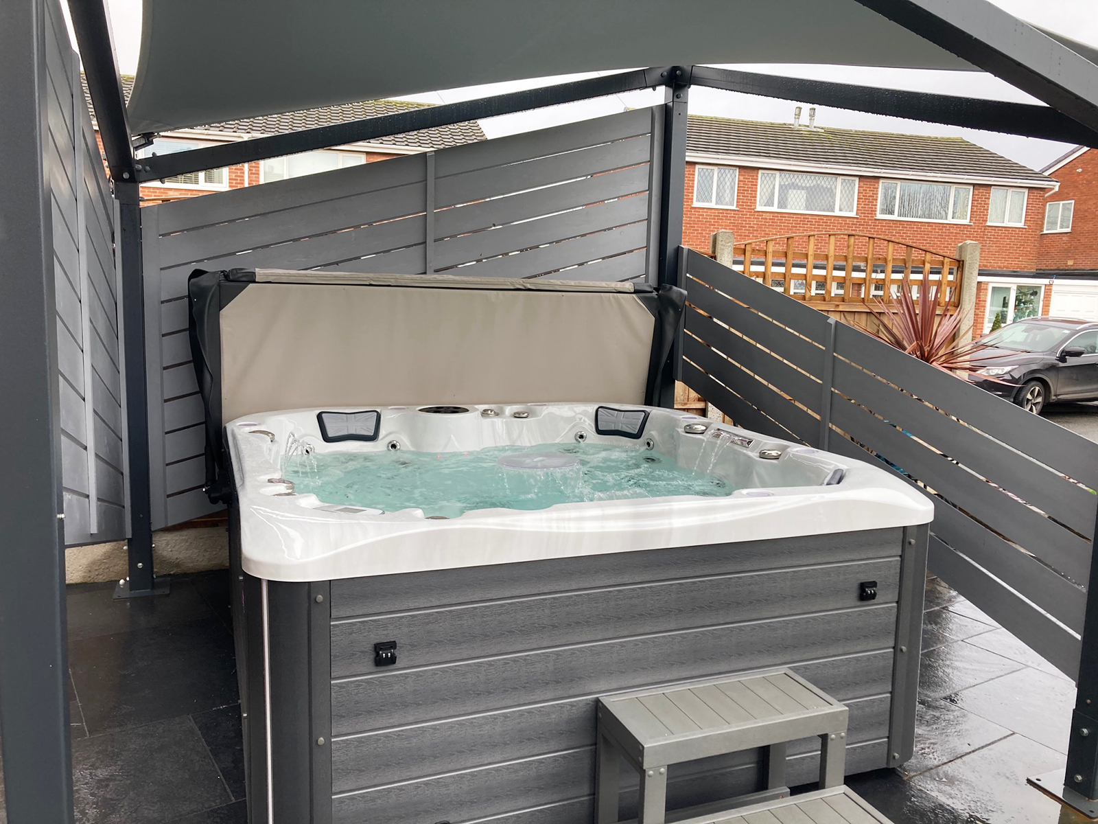 what hot tub is cheapest to run Slick Sail Gazebo and Balmoral Hot Tub Installation